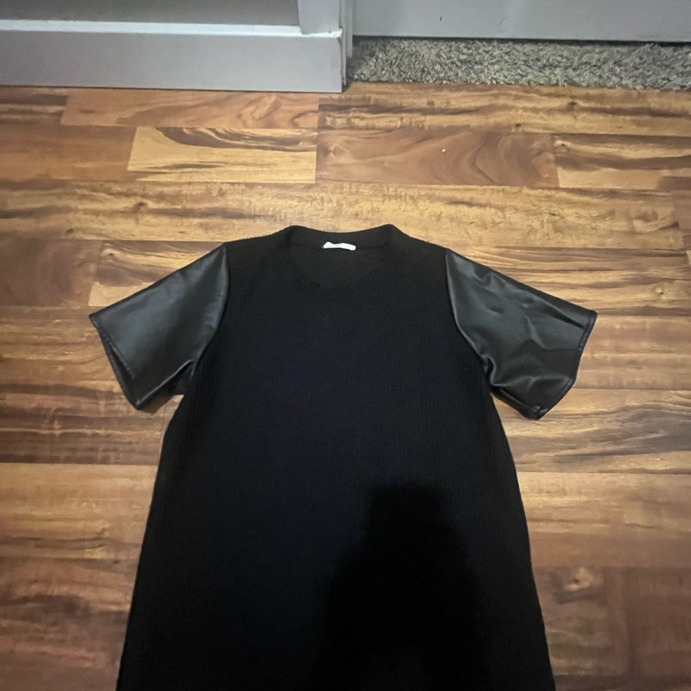 Chic Black Top with Faux Leather Sleeves